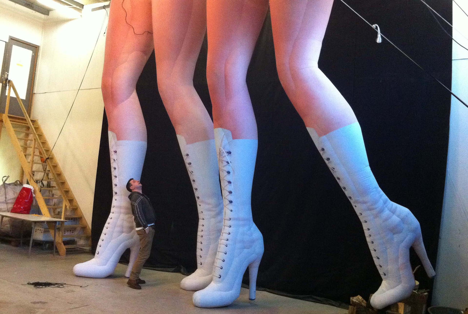 5m inflatable legs in knee-high boots Airworks Rentals