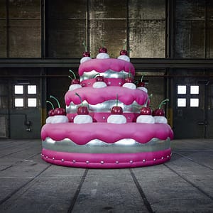 6.2m inflatable pink and silver cake in a warehouse