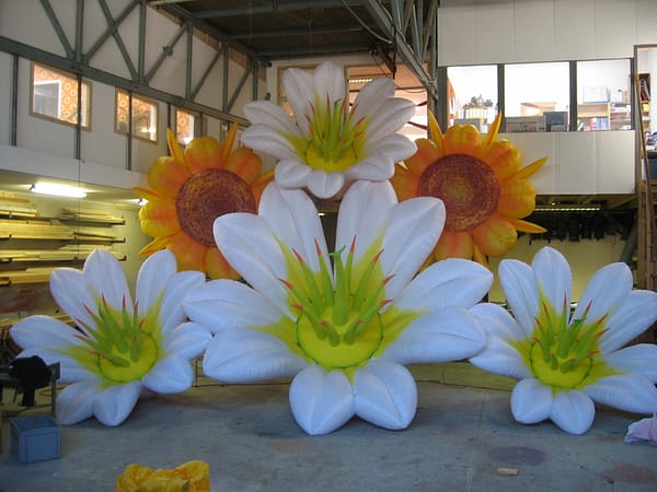 painted 3m lily and 2.5m sunflowers